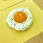 Raviolo monoporzione con tartufo e tuorlo